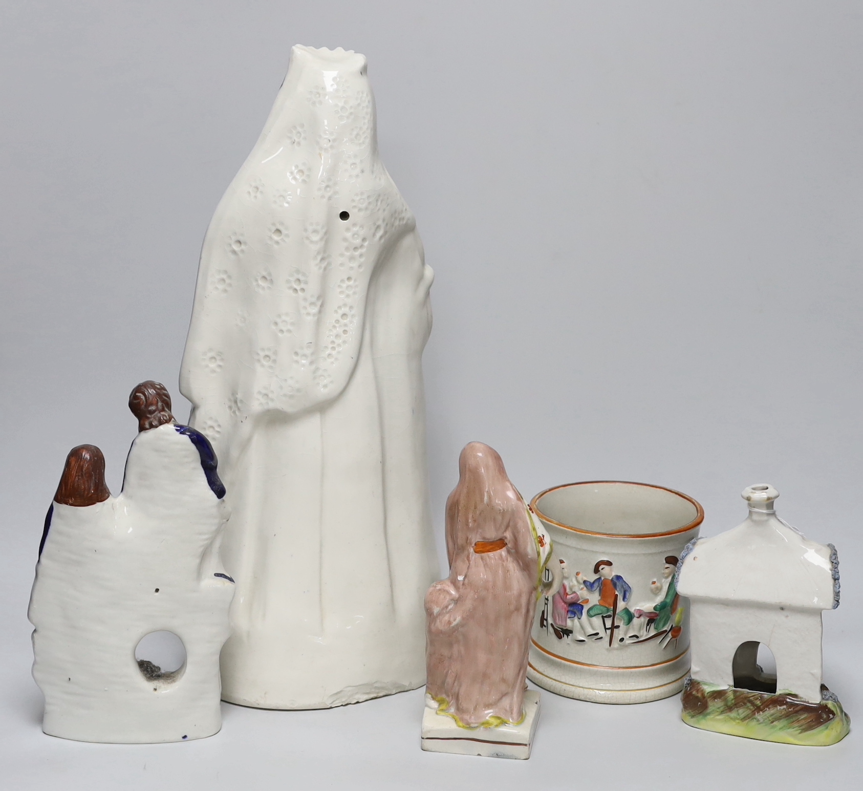 A tall Staffordshire pottery figure of Queen Victoria, a Staffordshire 'frog' mug and three various Staffordshire pottery figures (5), tallest 42cm high